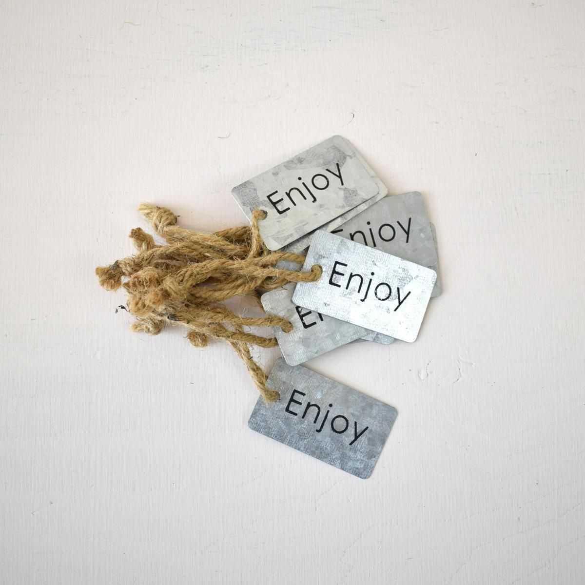 SET 10 TARGHETTE ZINCO-ENJOY- CM.6X3,5 NATURALE SET 10 TARGHETTE ZINCO-ENJOY- CM.6X3,5 NATURALE